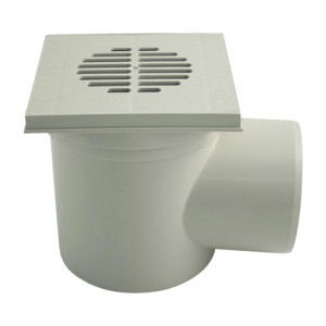 Siphon de cave Marley DN 110 avec partie supérieure rotative et grille en plastique.