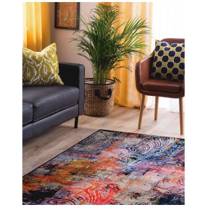 Tapis à poils courts coloré Mardin, 160x230 cm, avec motif abstrait dans un salon.