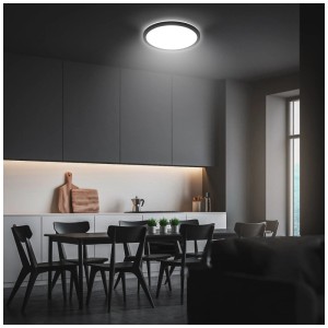 Plafonnier LED moderne Briloner Kada, noir, blanc neutre, 2400 lumens, Ø 29,5 cm dans un salon.