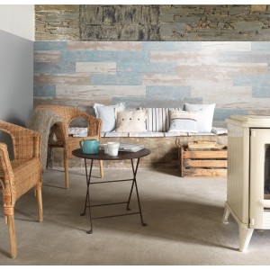 Panneau mural Grosfillex Element Compact Cabane Bleu dans un salon. Panneaux décoratifs aspect bois.