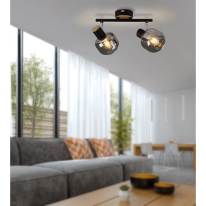 Moderna lampada da soffitto Näve Fumoso con 2 faretti e paralumi in vetro colorato nel soggiorno.