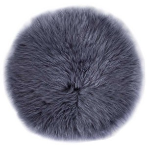 Coussin d'assise rond en peau de mouton véritable gris foncé (Ø 34 cm) pour chaises et bancs.