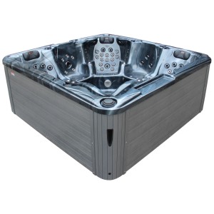 Spa extérieur noir Sonnenkönig Aruba pour le jardin. Spa fixe avec habillage gris.