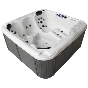 Spa extérieur blanc Sonnenkönig Sansibar avec jets de massage et habillage gris.