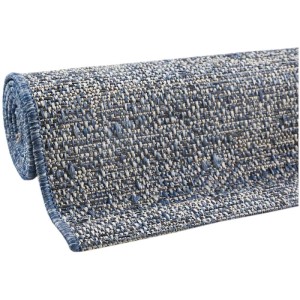 Tappeto Andiamo Clyde arrotolato in blu e beige, adatto per interni ed esterni.
