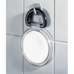 Miroir cosmétique Wenko avec grossissement 3x, suspendu sur des carreaux muraux.
