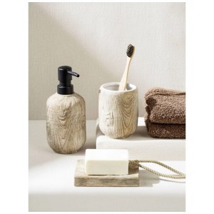 Portaspazzolino beige Wenko Florio in ceramica con texture legno e spazzolino.