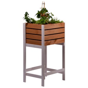 Carré potager surélevé Urban Gardening en bois, 90x49,5x42 cm, rempli de plantes.