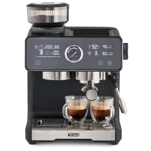 Macchina da caffè Trisa Smart Barista con due tazze di espresso.