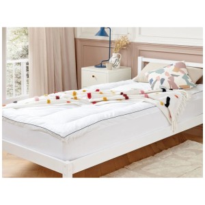 Topper per materasso Beliani 90x200 cm in cotone Japara bianco su un letto.