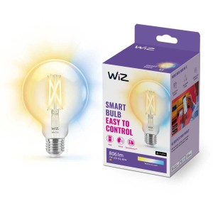 Lampadina LED a filamento WiZ Globe G95 E27, trasparente, 60W, accanto alla confezione del prodotto.