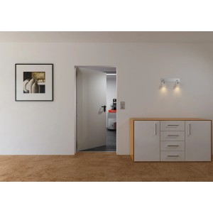 Porte coupe-feu Hörmann EI30 (200x87,5 cm) ouverte, gris-blanc, dans salon avec commode et tableau.