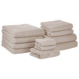 Ensemble de 11 serviettes Beliani Areora en coton beige avec texture gaufrée.