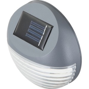 Graue Globo Solarleuchte zur Zaunbeleuchtung mit transparentem Lampenschirm.