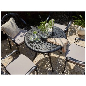 Tavolo da giardino nero Beliani Ancona in alluminio, Ø 90 cm, con motivi decorativi e spazio per quattro persone.