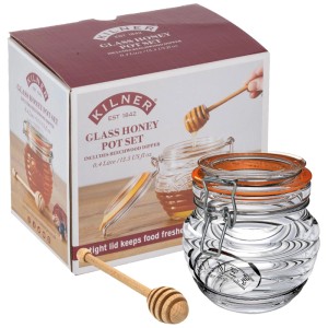Vaso Kilner per miele 400 ml in vetro con chiusura a clip, guarnizione arancione e mestolo in legno.