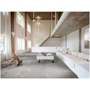 Revêtement de sol CV Strong aspect béton anthracite, largeur 4m dans un salon moderne.