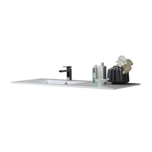 Lavabo singolo in fusione minerale bianca (sinistra) con rubinetto e decorazioni. Per bagno.