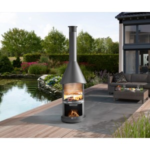 Barbecue en acier inoxydable Buschbeck Auckland gris foncé avec grille dans le jardin.