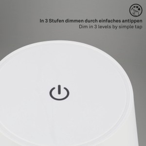 Gros plan de la lampe de table sans fil blanche Brilo avec variateur tactile et symbole marche/arrêt.