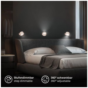 Spots muraux à batterie Briloner Tari beige au-dessus d'un lit. Lampe murale LED flexible et dimmable avec support magnétique.