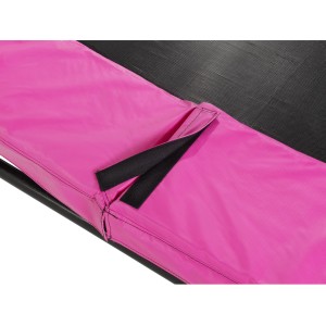 Dettaglio: Bordo di protezione rosa con chiusura a velcro sul trampolino interrato EXIT Silhouette.