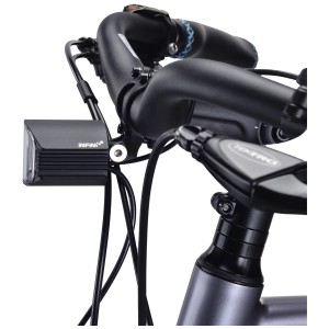 Infini E-Bike Front Light Lux avec 6 LED, boîtier en aluminium, monté sur le guidon du vélo.