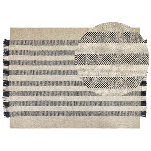 Tapis blanc Beliani Tacettin en laine (160x230 cm) à rayures et franges.