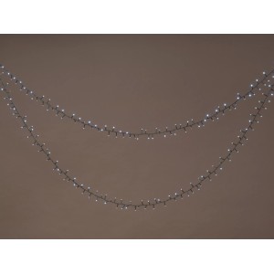 Guirlande lumineuse extérieure OBI 3000 LED blanc froid, 6m, illuminée et drapée pour jardin.