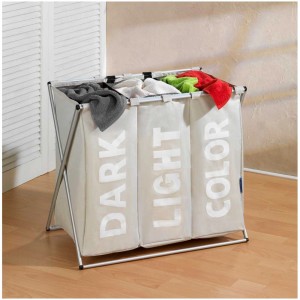 Cesto portabiancheria Wenko Trio beige con 3 scomparti (43 l ciascuno) per bucato scuro, chiaro e colorato.