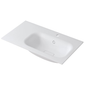 Lavabo rettangolare in acrilico bianco opaco con troppopieno e area di stoccaggio laterale.