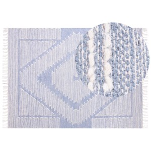 Tapis en coton bleu Ansar (160x230 cm) avec motif géométrique et franges.