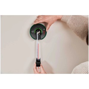 Laser lignes Bosch Atino avec mètre intégré utilisé sur un mur.