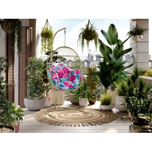 Sedia sospesa Palmwoods verde con struttura in acciaio e cuscini floreali su balcone o patio.