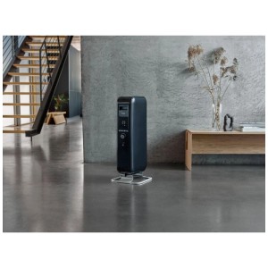 Termosifone elettrico a olio Mill Gentle Air nero 1000 W con display in un soggiorno moderno.