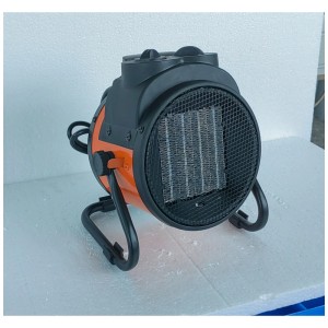 Chauffage soufflant céramique portable noir et orange, 2 kW, avec grille de protection et support.