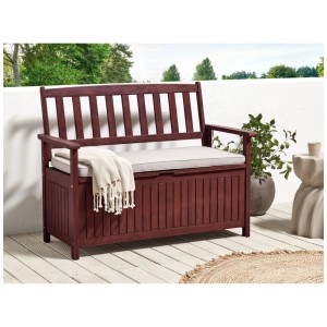 Banc de jardin Sovana rouge foncé avec coussin gris clair et espace de rangement sous l'assise.