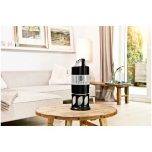 Lampada antizanzare Windhager Buster per ambienti fino a 60m², appoggiata su un tavolo.