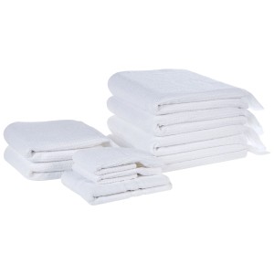 Set de 9 serviettes de bain Atiu en coton éponge blanc avec tapis de bain.
