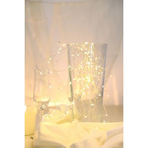 Catena luminosa a LED Globo con 100 LED bianco caldo, rame metallizzato, lunghezza 990 cm, per interni.