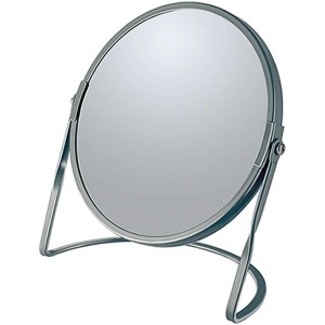 Specchio cosmetico grigio Spirella Akira con base e superficie rotonda.