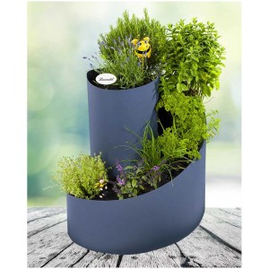 Spirale à herbes Gartec (Ø 80cm) plantée d'herbes. Carré potager surélevé en plastique au design moderne.