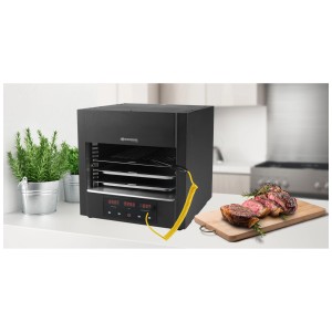 Sonnenkönig Grill elettrico Dragon 805: Grill compatto con bistecca su tagliere.