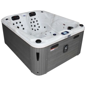Spa extérieur Sonnenkönig Lanai White, bain à remous fixe avec habillage gris et cuve intérieure blanche.