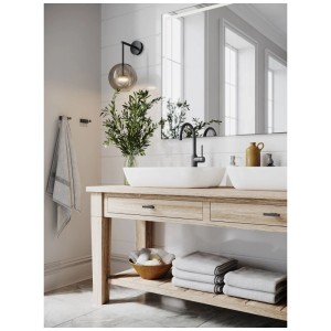 Appendiabiti doppio Siro in metallo nero opaco, lunghezza 72mm in bagno moderno.