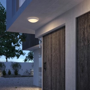 Plafonnier extérieur LED Philips Doris blanc (6W, 2700K) sur mur de maison.