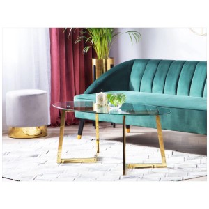 Élégante table basse Fresno avec plateau en verre et structure en métal doré dans le salon.