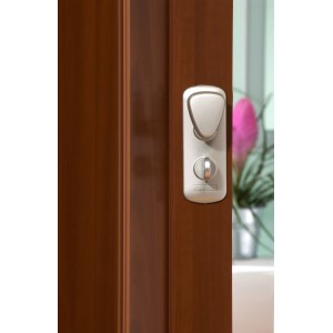 Porte pliante Spacy Palisandre, détail de la serrure.