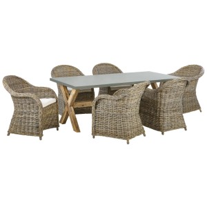 Ensemble de jardin Beliani Susua/Olbia: Table en fibrociment gris avec piètement bois, 6 chaises en rotin avec coussins clairs.