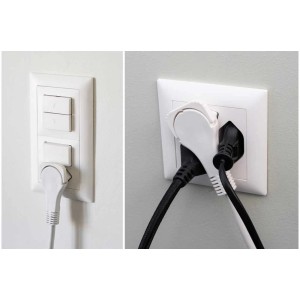 Rallonge Max Hauri TD avec fiche plate, 3 m, noire, dans la prise.